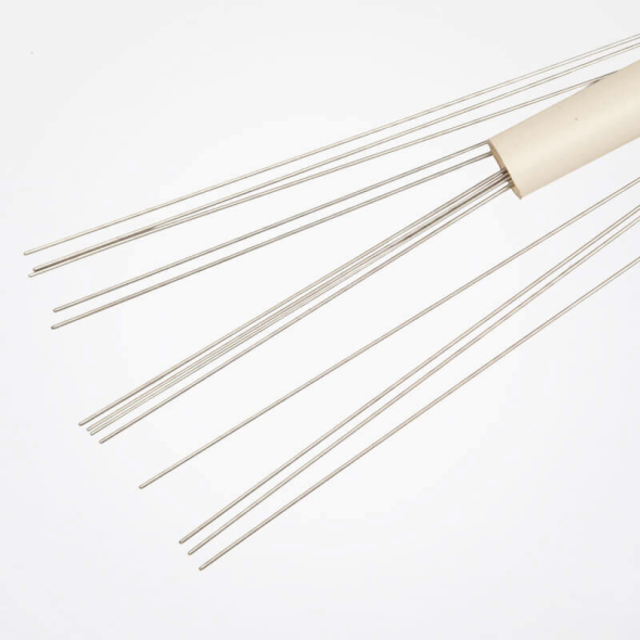 Koker met pennen en naalden voor het blokken