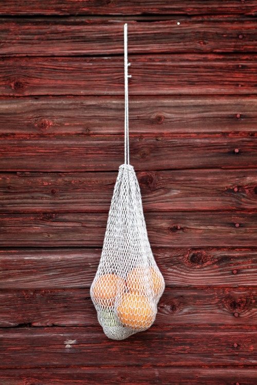 Gebreide fruittas met trektouw in linnen